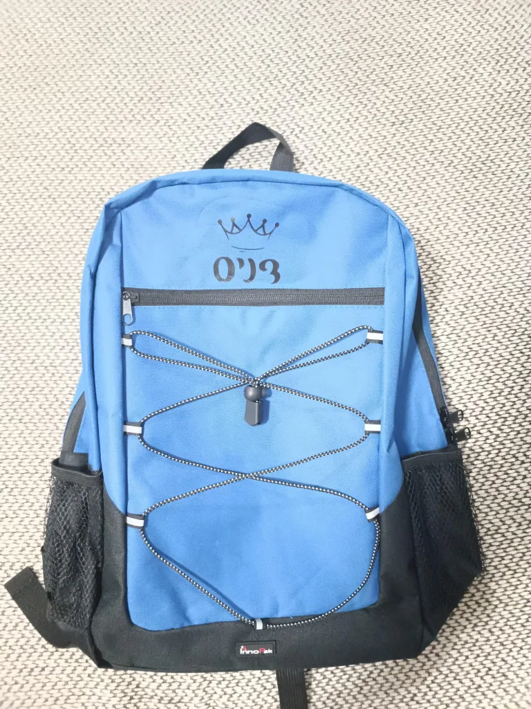 תיקים ממותגים ומוצרי טקסטיל